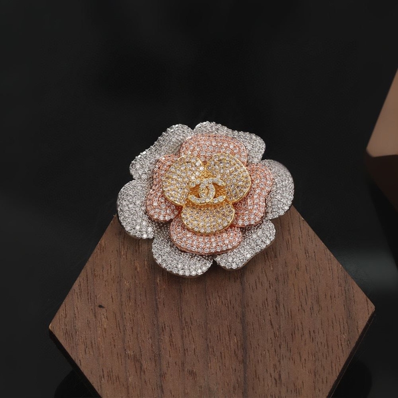 Ch**el brooches
